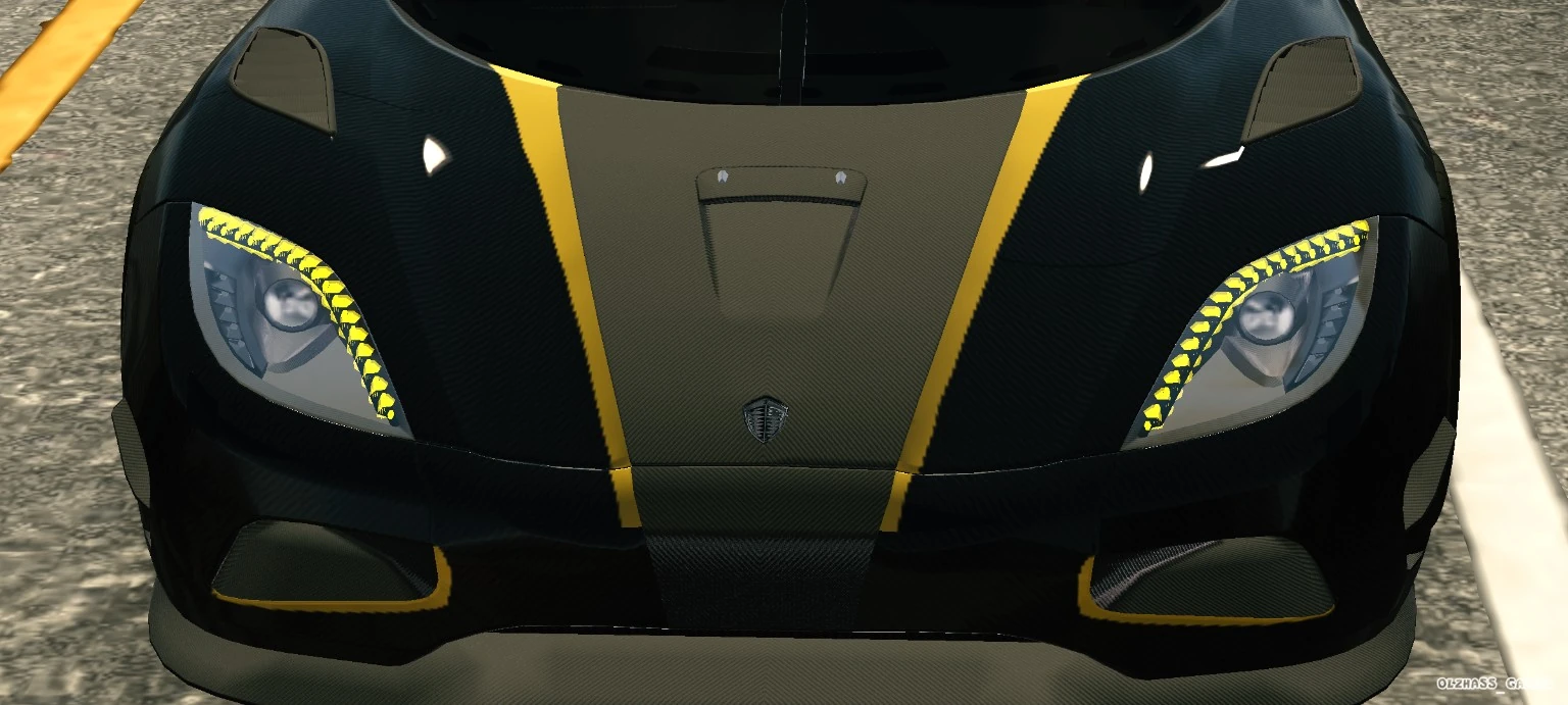 Black carbon hypercar front view with yellow LED headlights