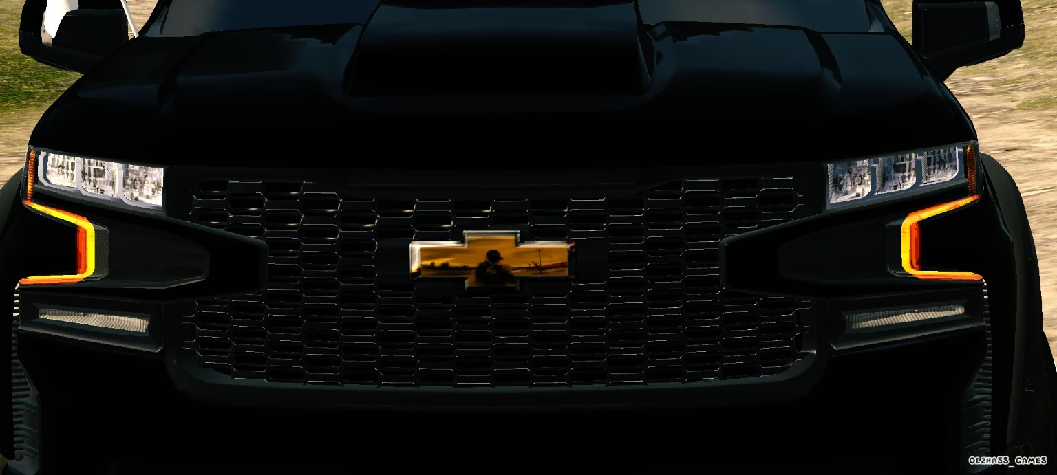 Black custom pickup truck front grille close-up